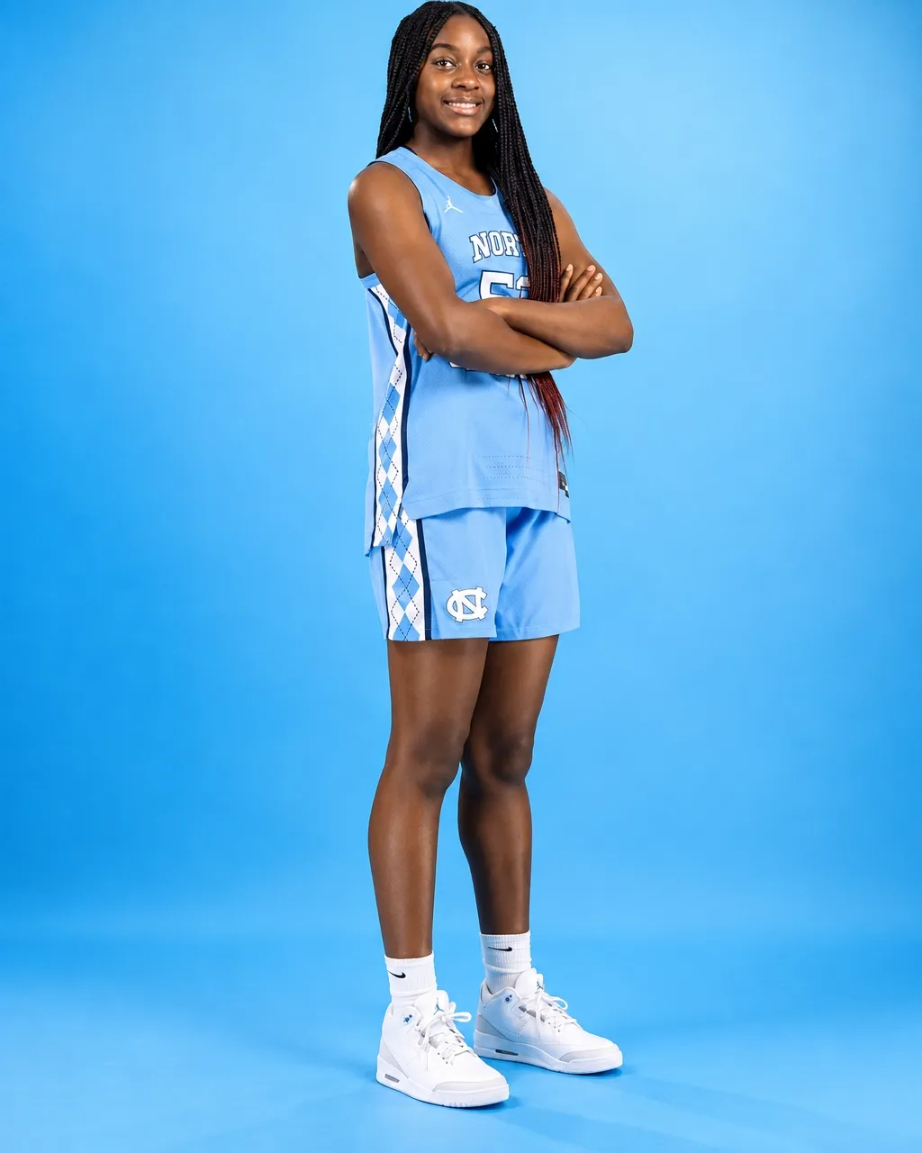 Noelle Bofia, number 52 for North Carolina, in a studio portrait with arms folded in side profile